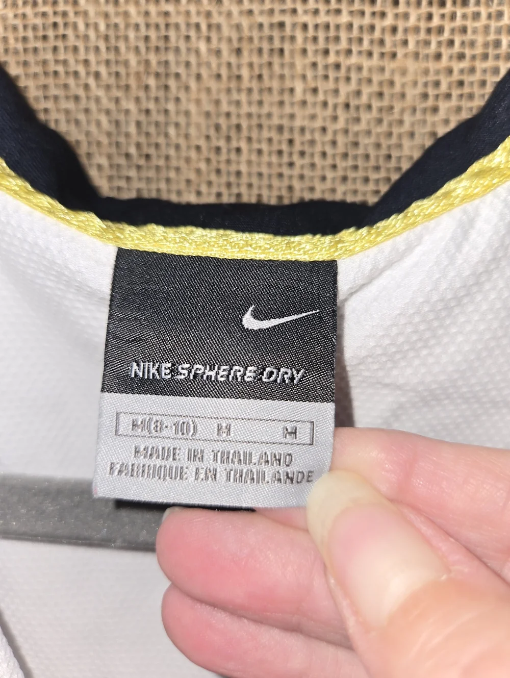 Nike White Sleeveless Polo Tank with Black Trim and Yellow Logo